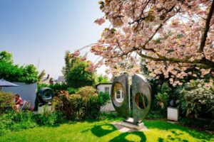 Barbara Hepworth sculpture located in her gardens at the St Ives attraction